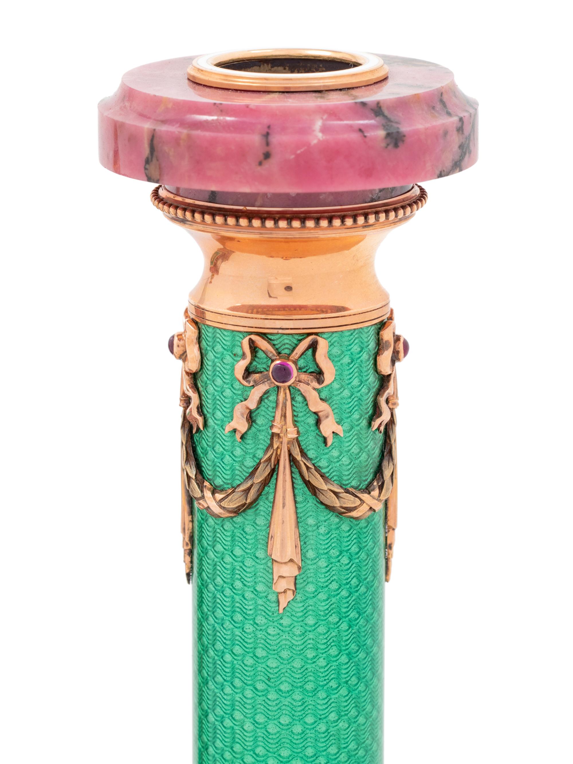 A Carved Hardstone, Enamel, 14-Karat Gold and Hardstone Mounted Three-Piece Clock Garniture
