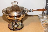 A Pair of Silver-Plate Chaffing Dishes Height of pair 14 inches.