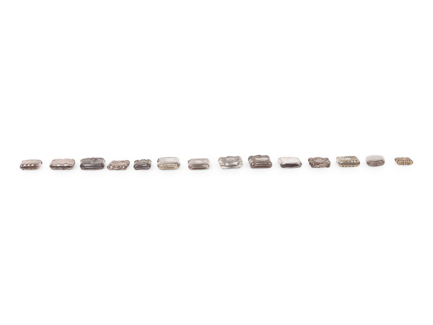 A Group of Fourteen Silver Match Safes
