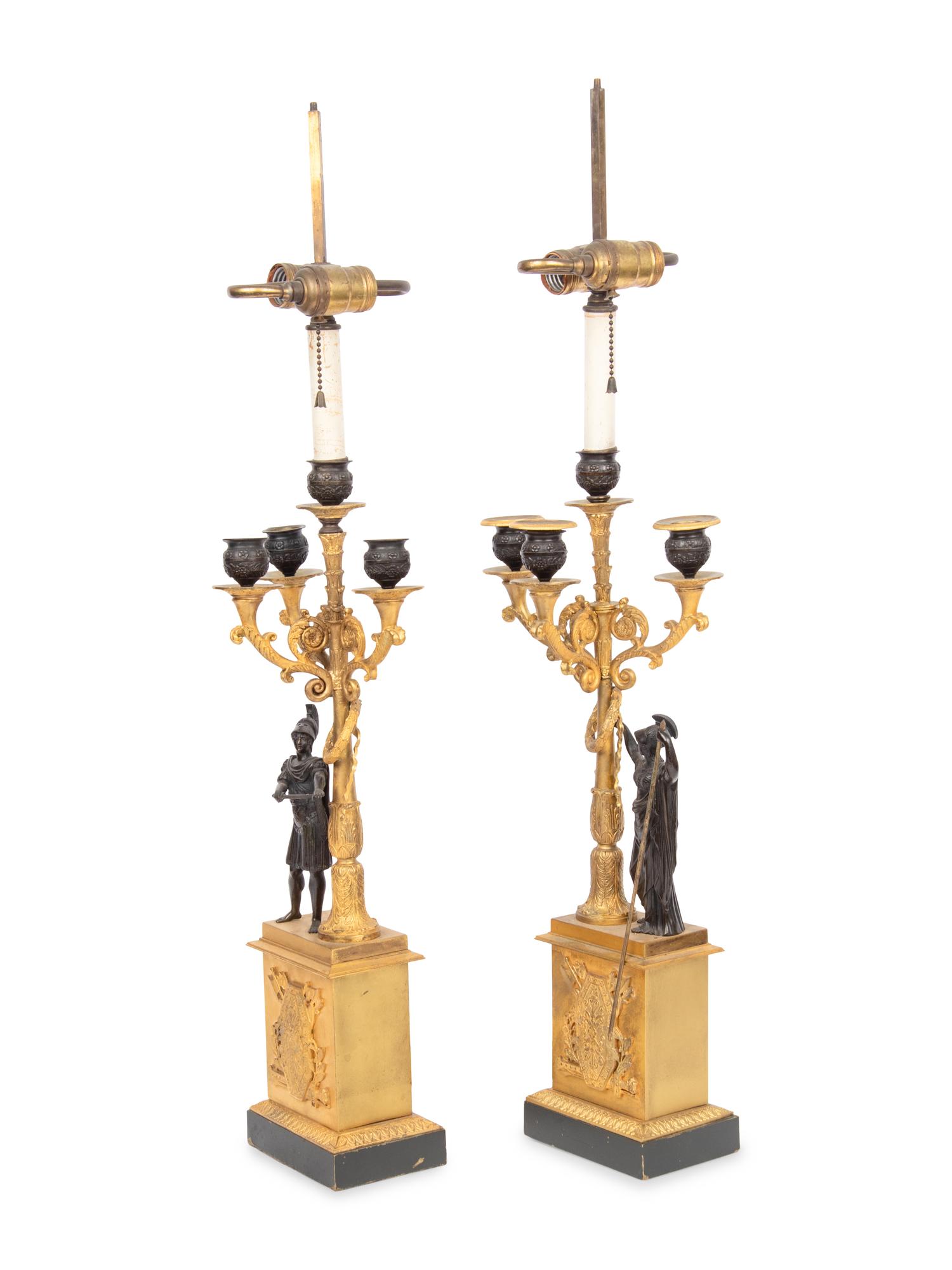 A Pair of Empire Gilt and Patinated Bronze Four-Light Candelabra
