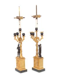 A Pair of Empire Gilt and Patinated Bronze Four-Light Candelabra