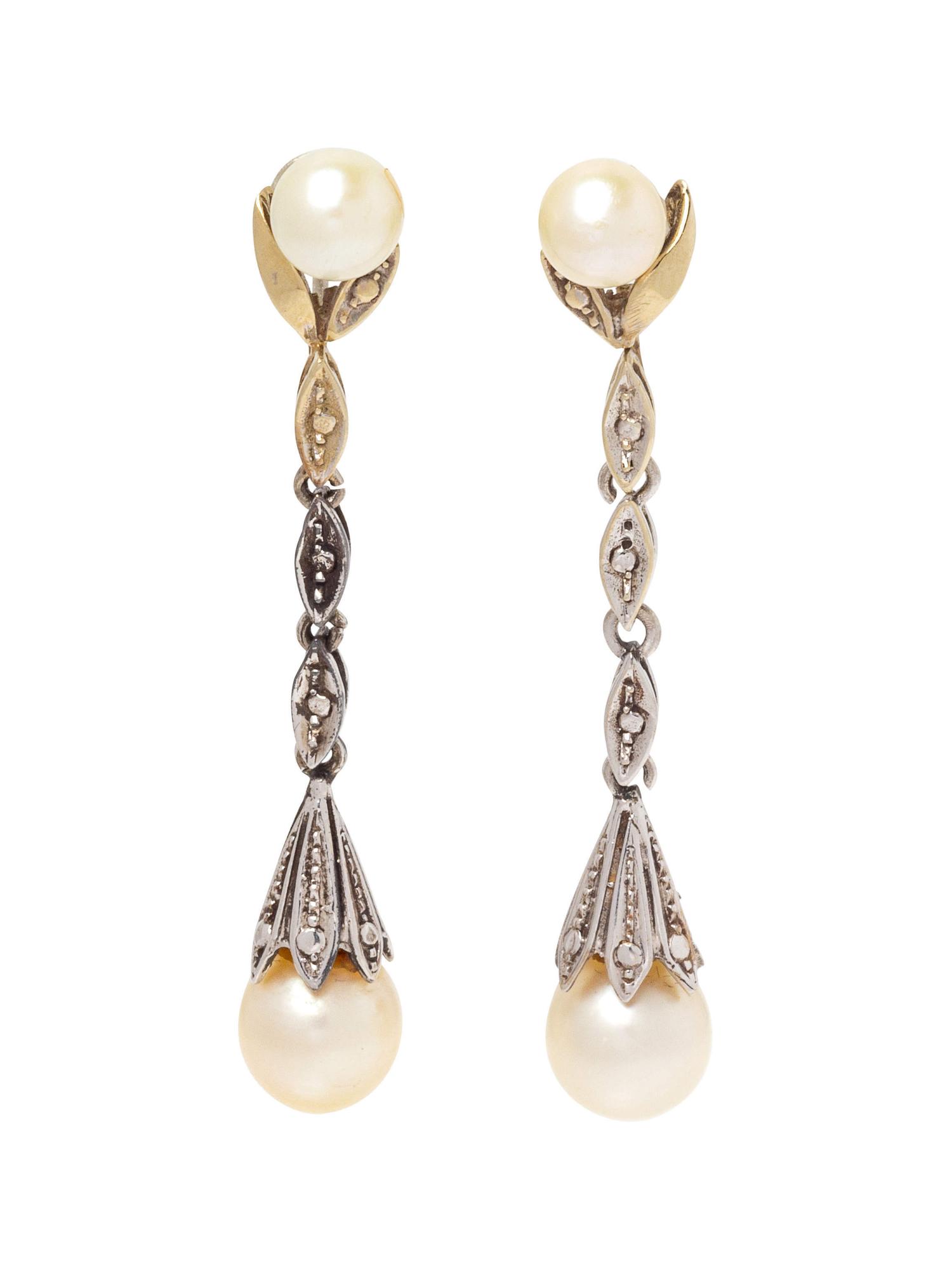 A Pair of White Gold and Cultured Pearl Earclips,