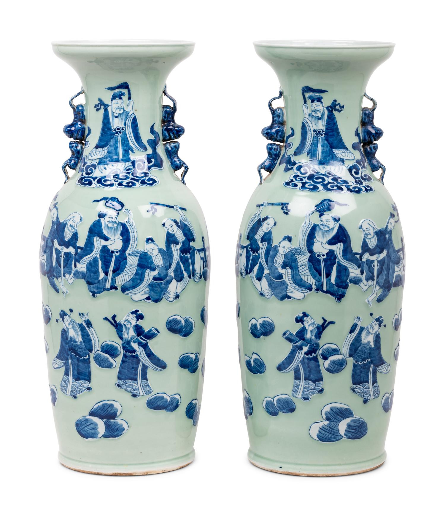 A Pair of Celadon Ground Underglaze Blue Porcelain 'Eight Immortals' Baluster Vases
