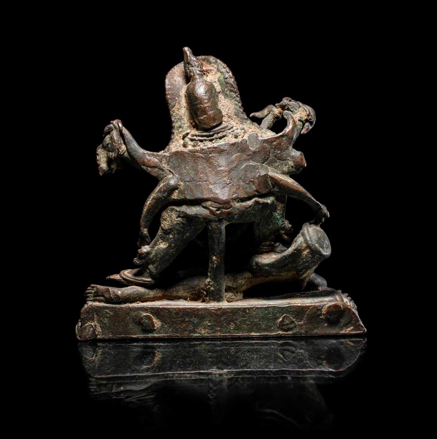 A Nepalese Parcel Gilt Bronze Figure of Kali