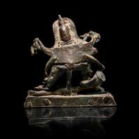 A Nepalese Parcel Gilt Bronze Figure of Kali