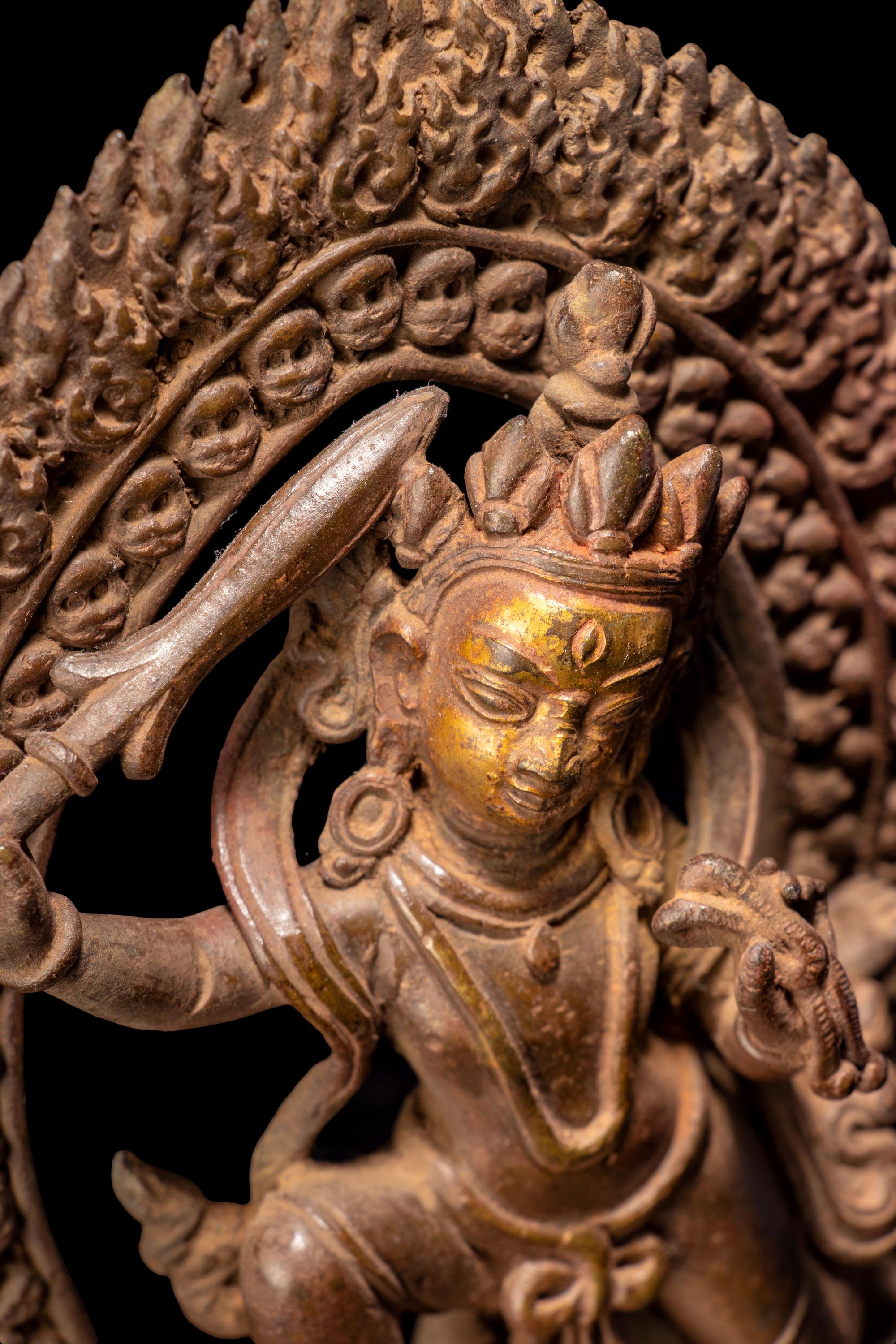 A Sino-Tibetan Bronze Figure of a Deity