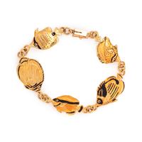 GAYLE BRIGHT, YELLOW GOLD AND ENAMEL FISH BRACELET