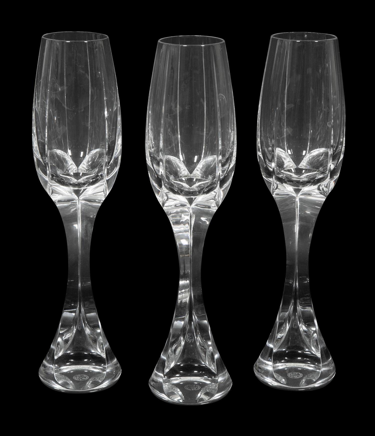 A Set of Twelve Baccarat Neptune Champagne Flutes