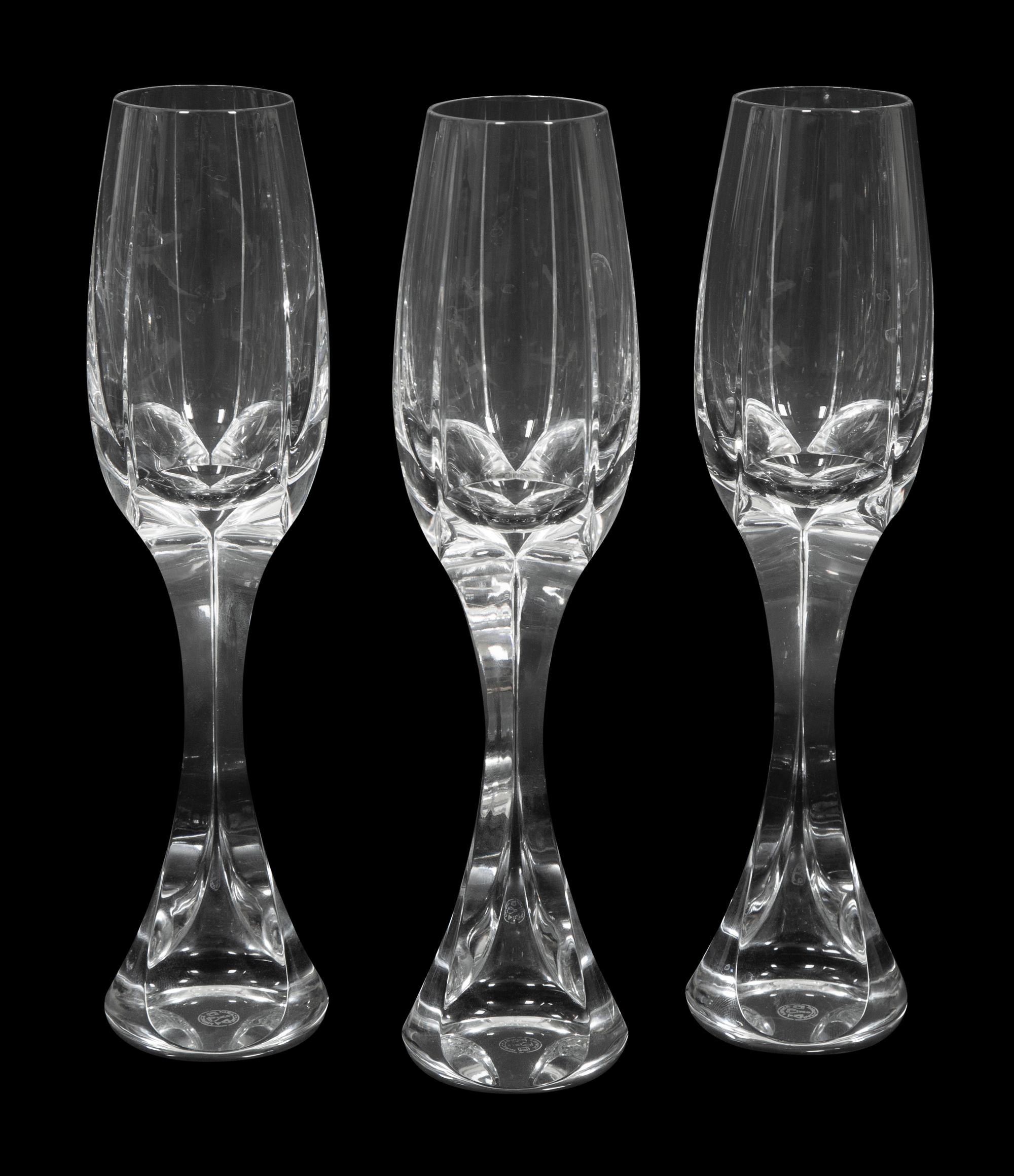 A Set of Twelve Baccarat Neptune Champagne Flutes