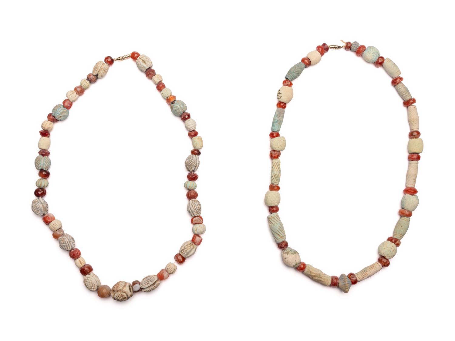 Two Egyptian Carnelian, Faience, and Ceramic Necklaces