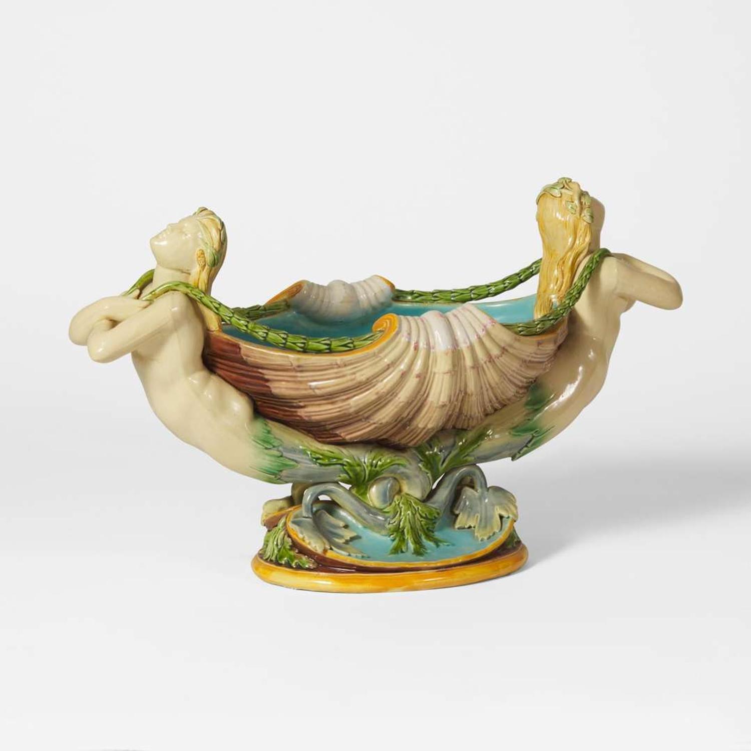 A Minton majolica figural centerpiece Bearing date mark for 1868