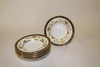 A Set of Eight Minton Porcelain Bowls. Diameter 7 3/4 inches.