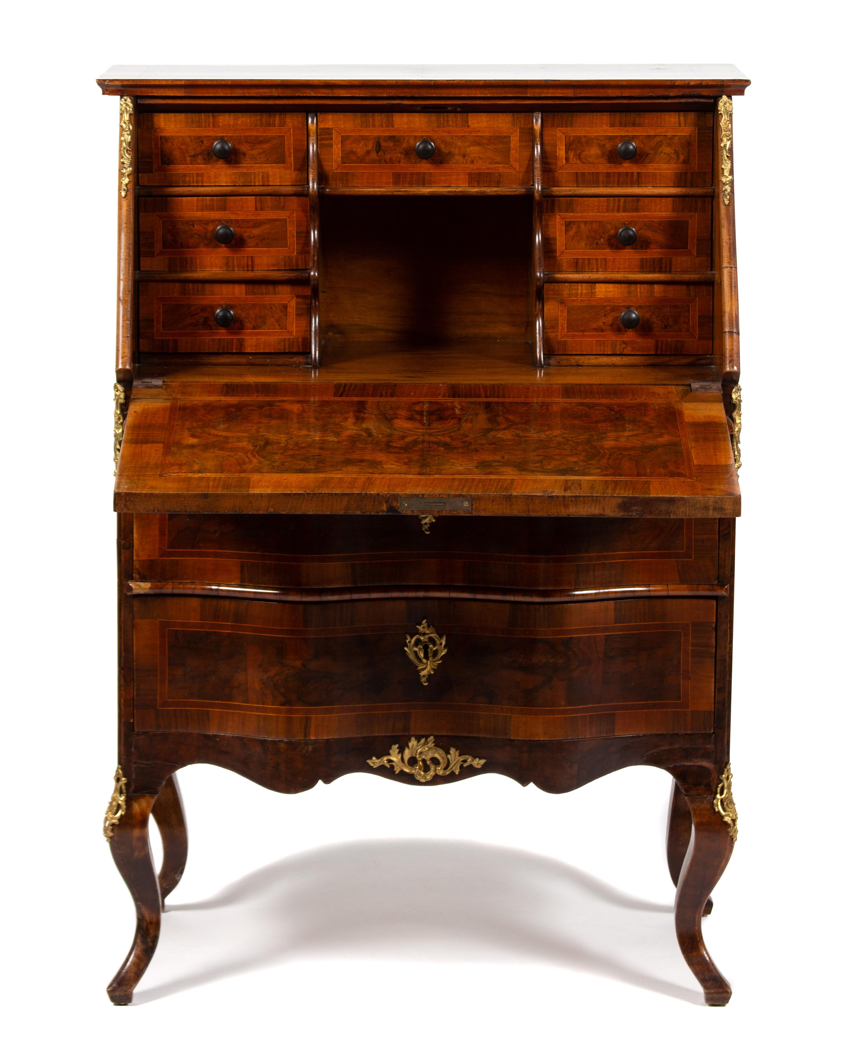A Continental Rococo Style Gilt Bronze Mounted Inlaid Walnut Drop Front Desk Height 44 3/4 x width 31 3/4 x depth 18 inches. — 19TH CENTURY