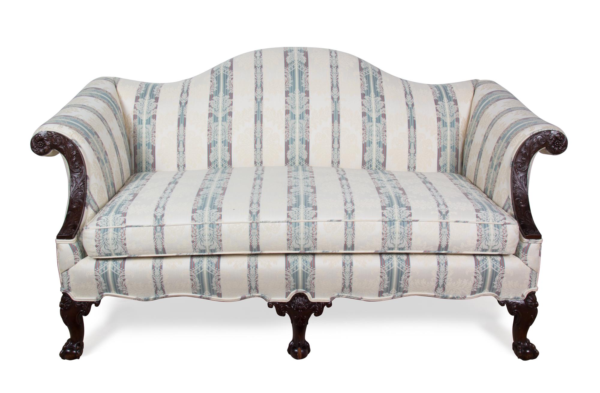 A Chippendale Style Mahogany Camel Back Love Seat Height 34 x width 64 x depth 36 inches. — 20TH CENTURY