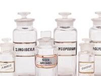 A Collection of Clear Glass Apothecary Jars