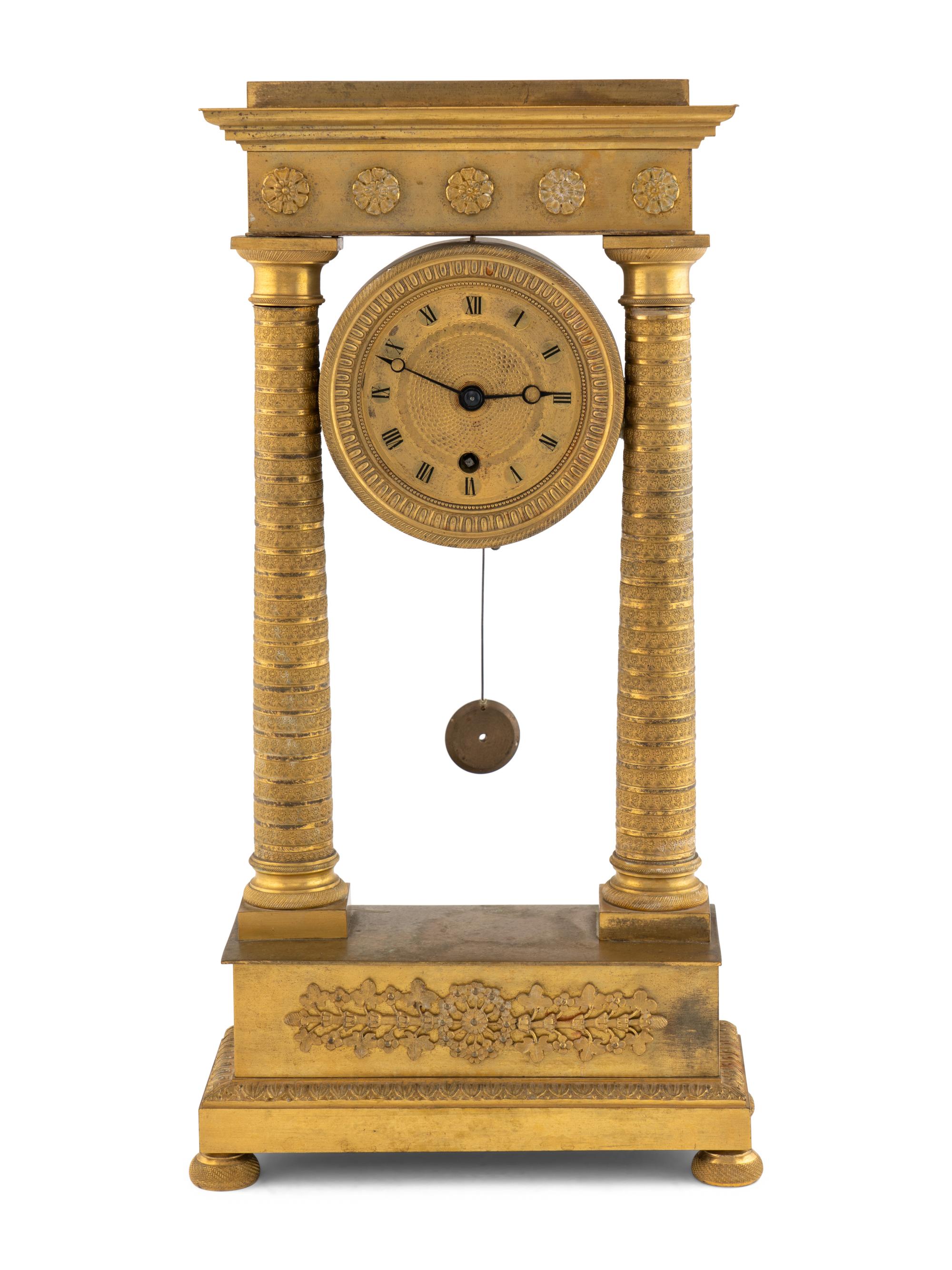 An Empire Gilt-Bronze Mantle Clock