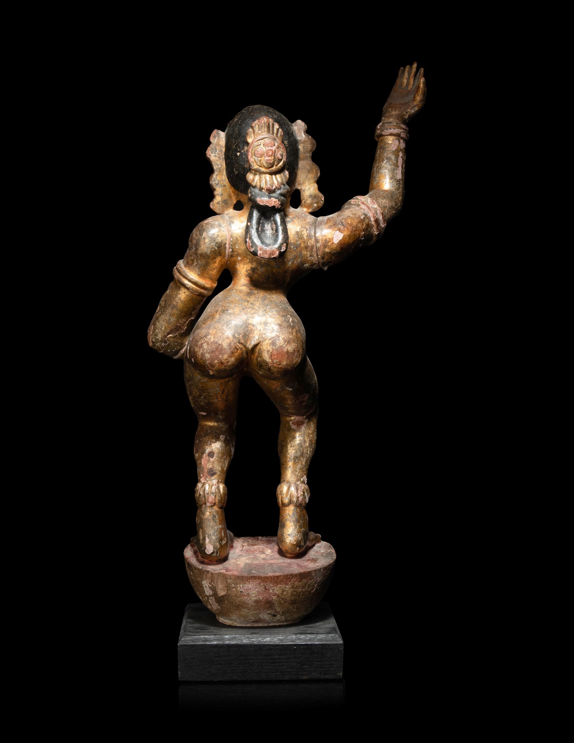 An Indian Gilt Highlighted Carved Wood Dancing Figure