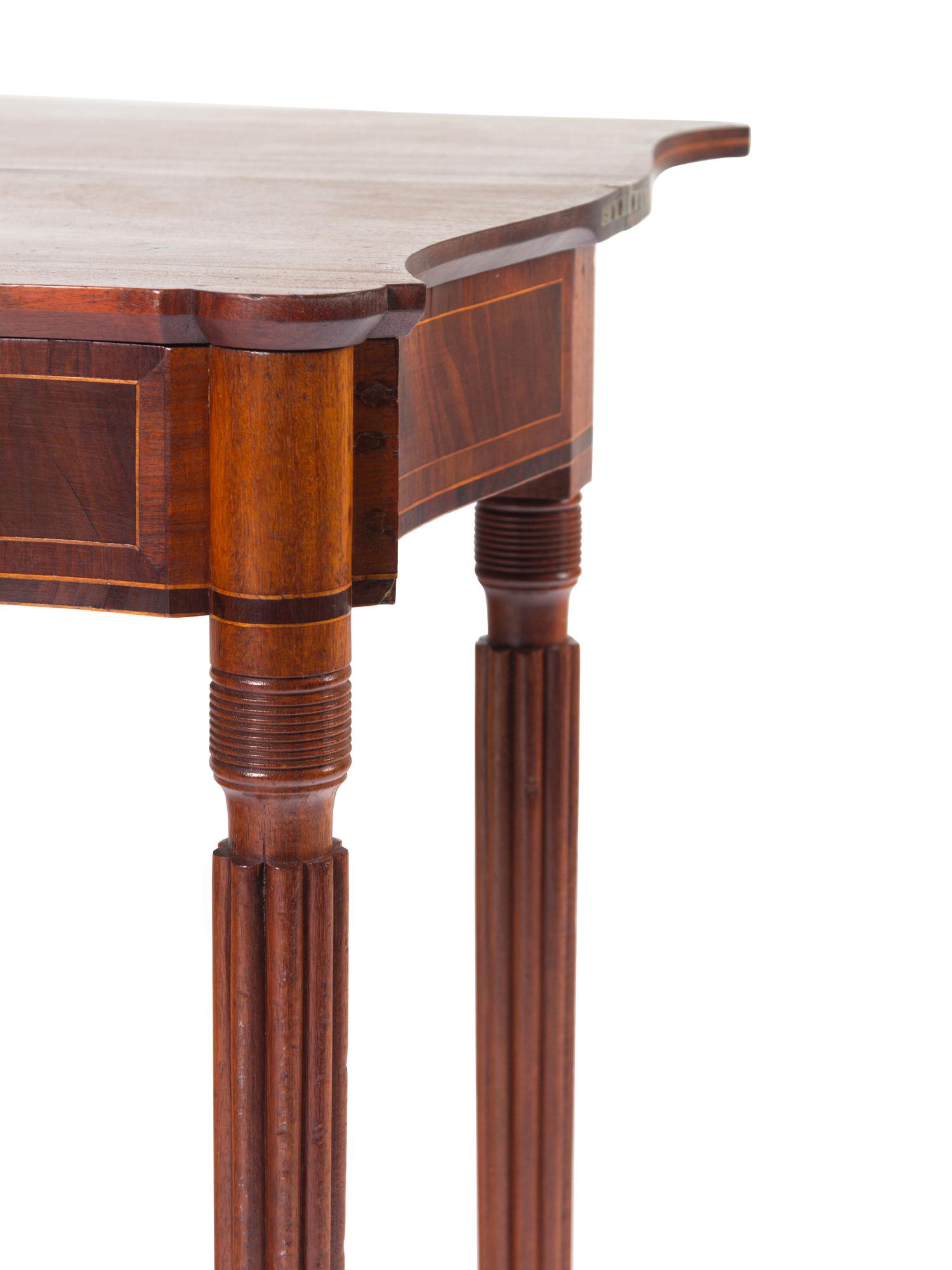 A Federal Style Mahogany Flip-Top Table