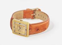 A Ladies 18K Yellow Gold and Diamond LeCoultre Watch
