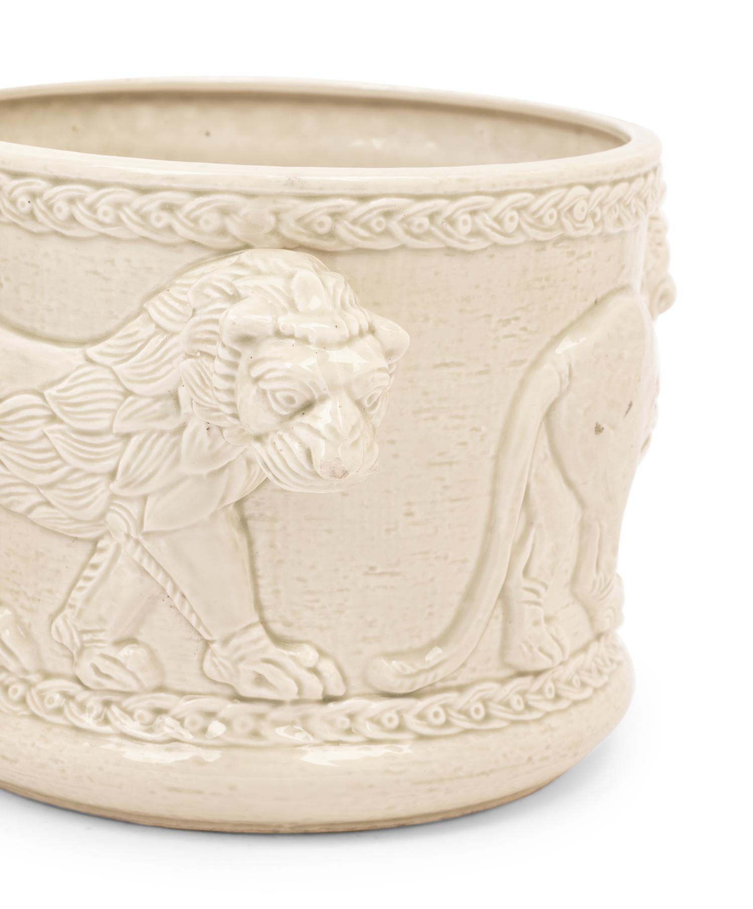 A Pair of Fitz and Floyd Glazed Ceramic Jardinières Modeled with Lions