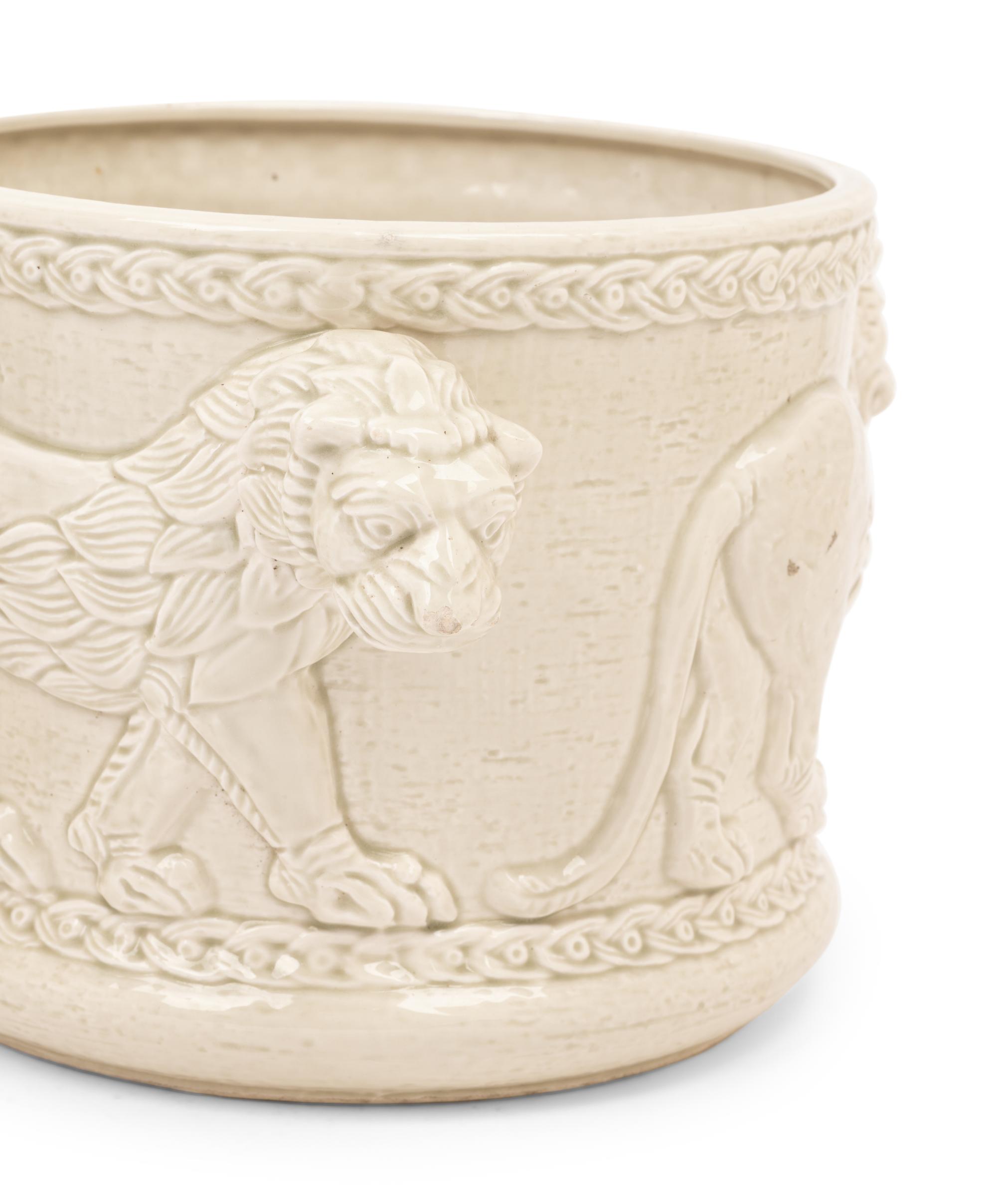 A Pair of Fitz and Floyd Glazed Ceramic Jardinières Modeled with Lions