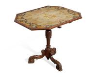 A Victorian Baroque Revival Tilt-Top Table with Needlework Top