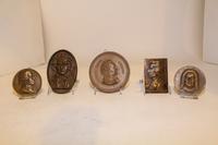 A Set of Five Plaques Length of longest 4 3/4 inches.