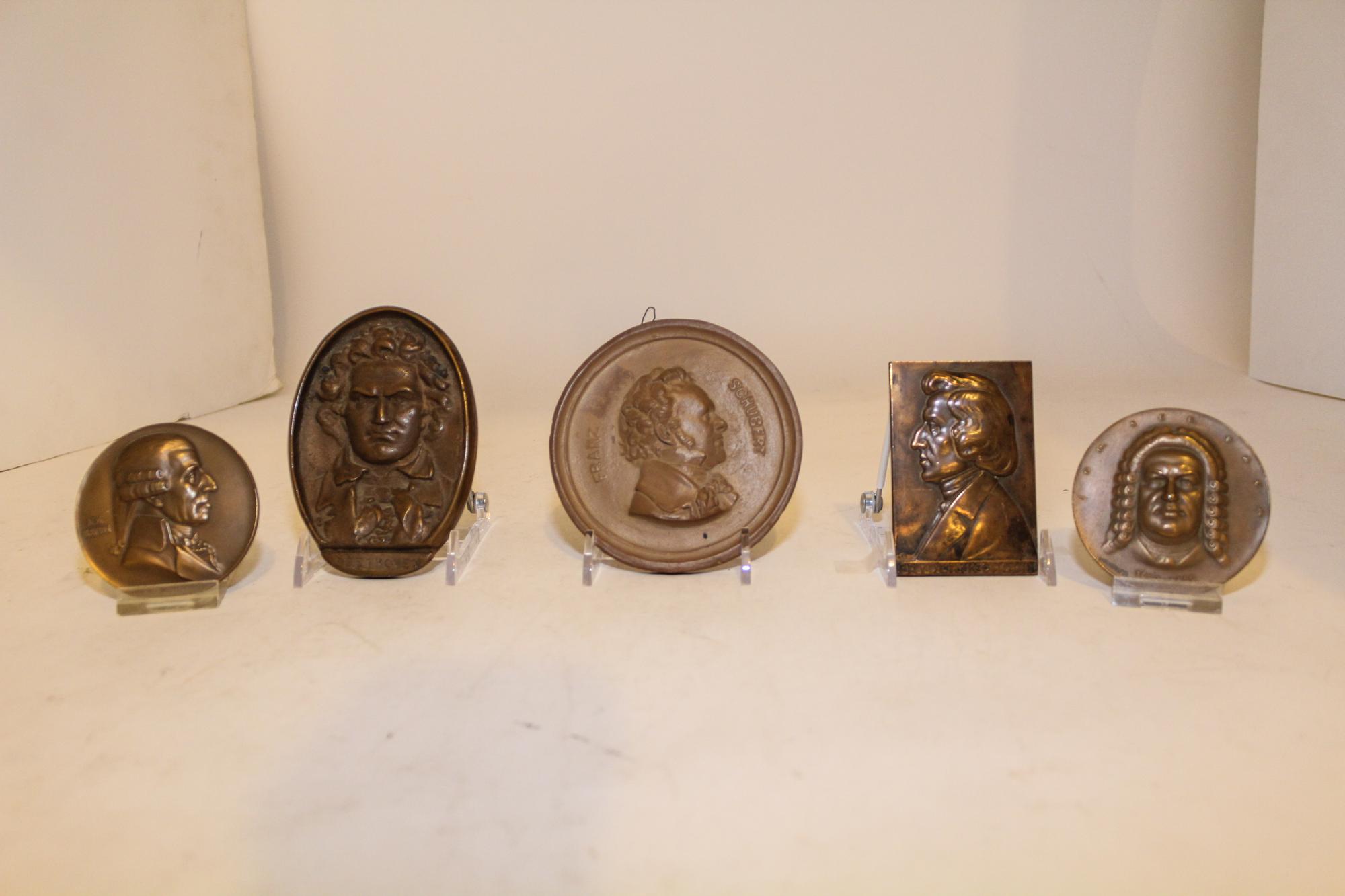 A Set of Five Plaques Length of longest 4 3/4 inches.