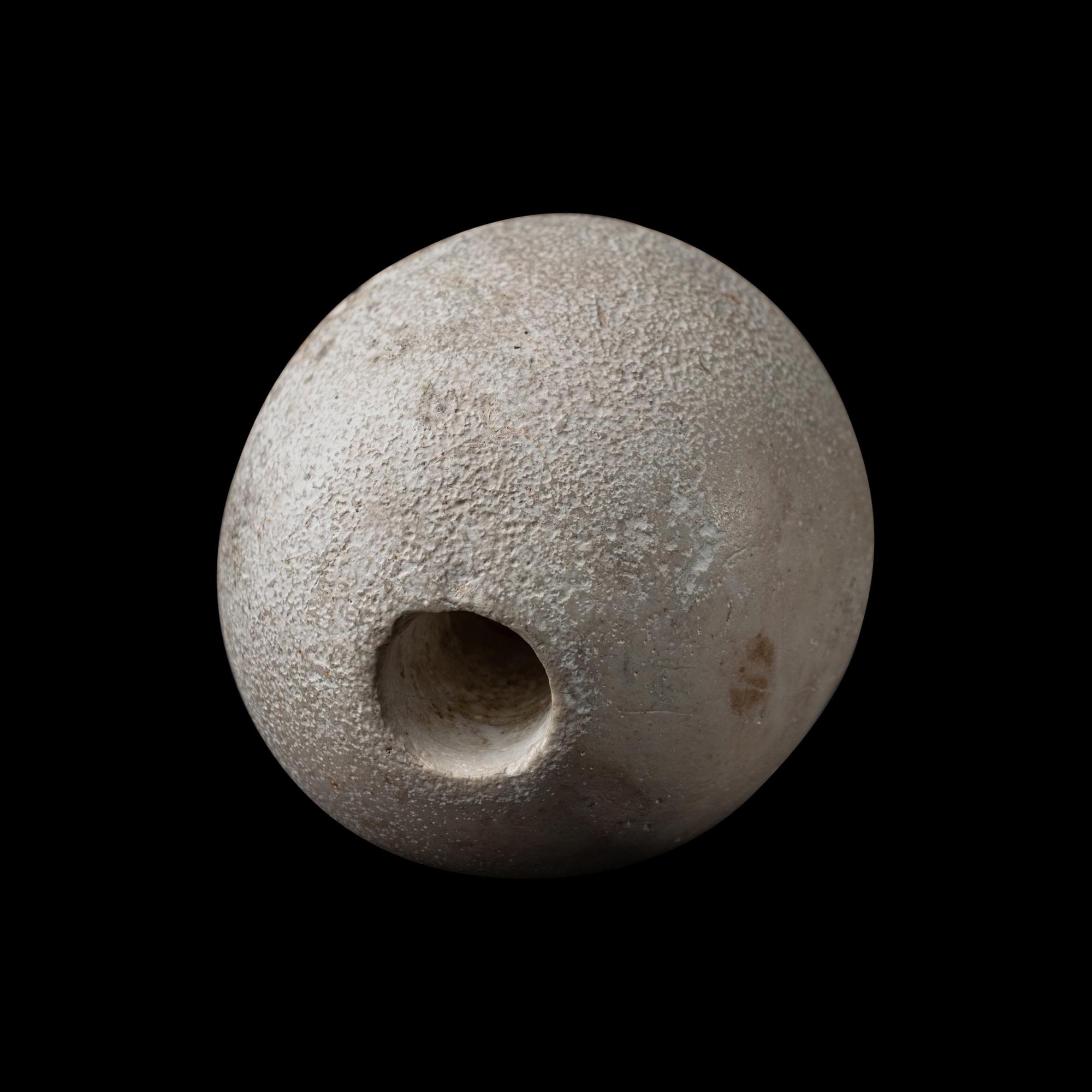 An Egyptian Limestone Mace Head