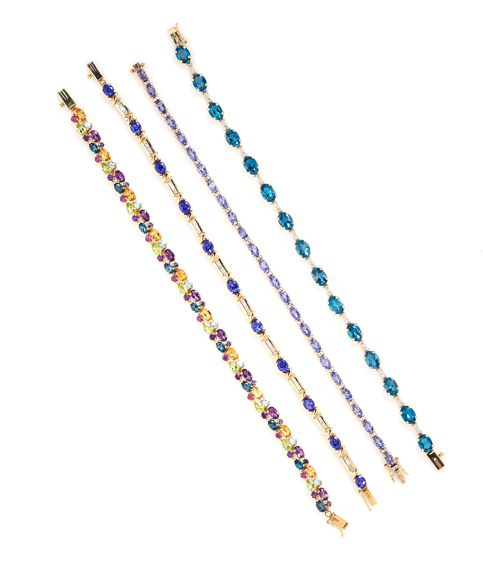 A Collection of 14 Karat Yellow Gold and Multigem Line Bracelets, 24.90 dwts.