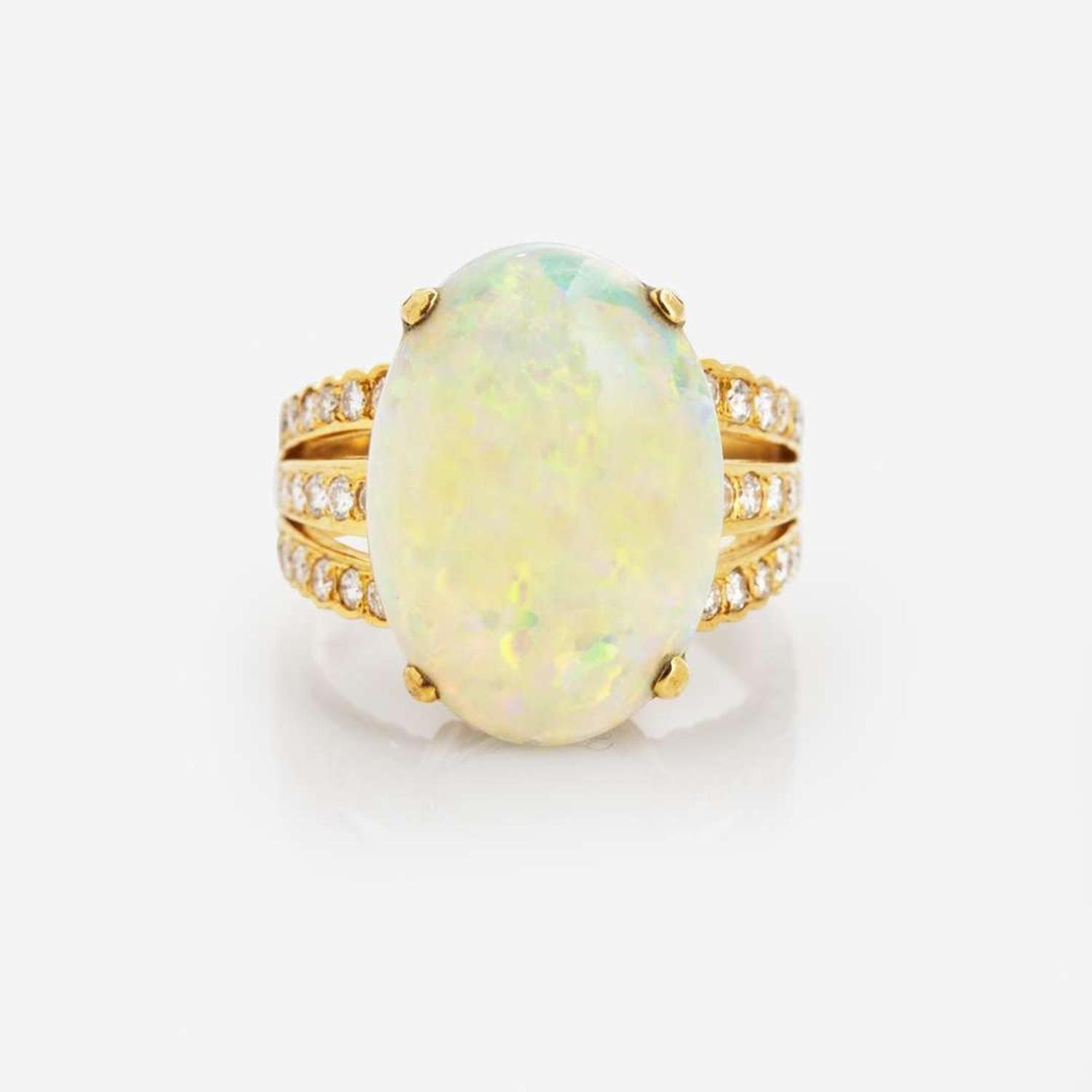 An 18K Yellow Gold, Diamond, and Opal Ring