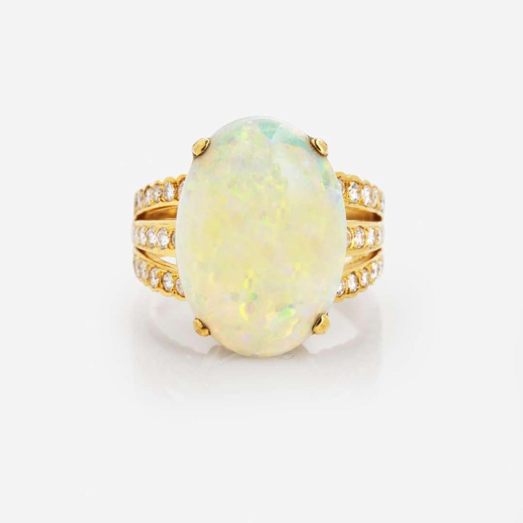 An 18K Yellow Gold, Diamond, and Opal Ring