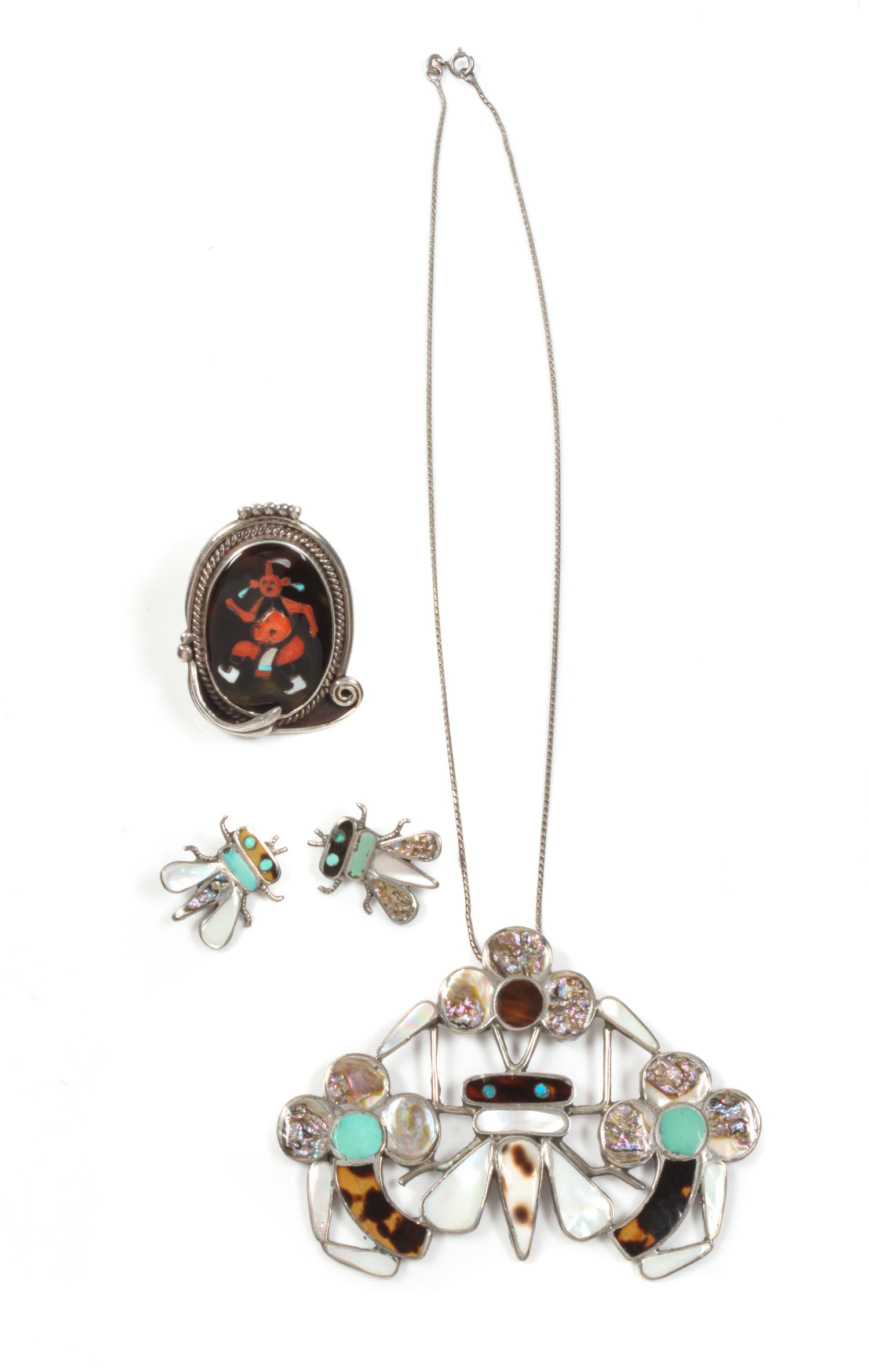 Three Zuni Silver and Multi-Gem Flush Inlay Pendant Height of pendant 2 1/2 x width 3 1/2 inches