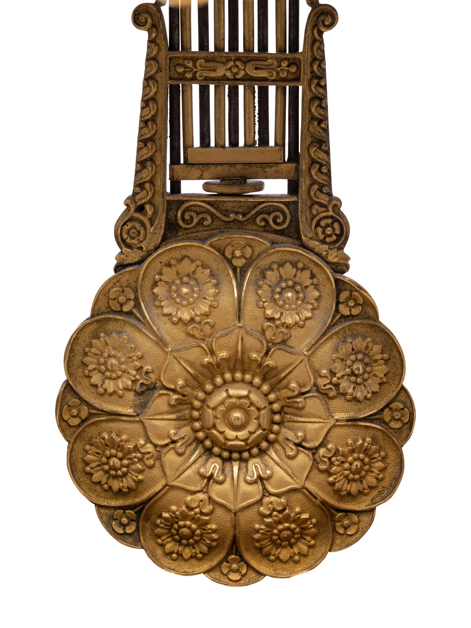 A Charles X Gilt Bronze Mounted Mahogany Portico Clock