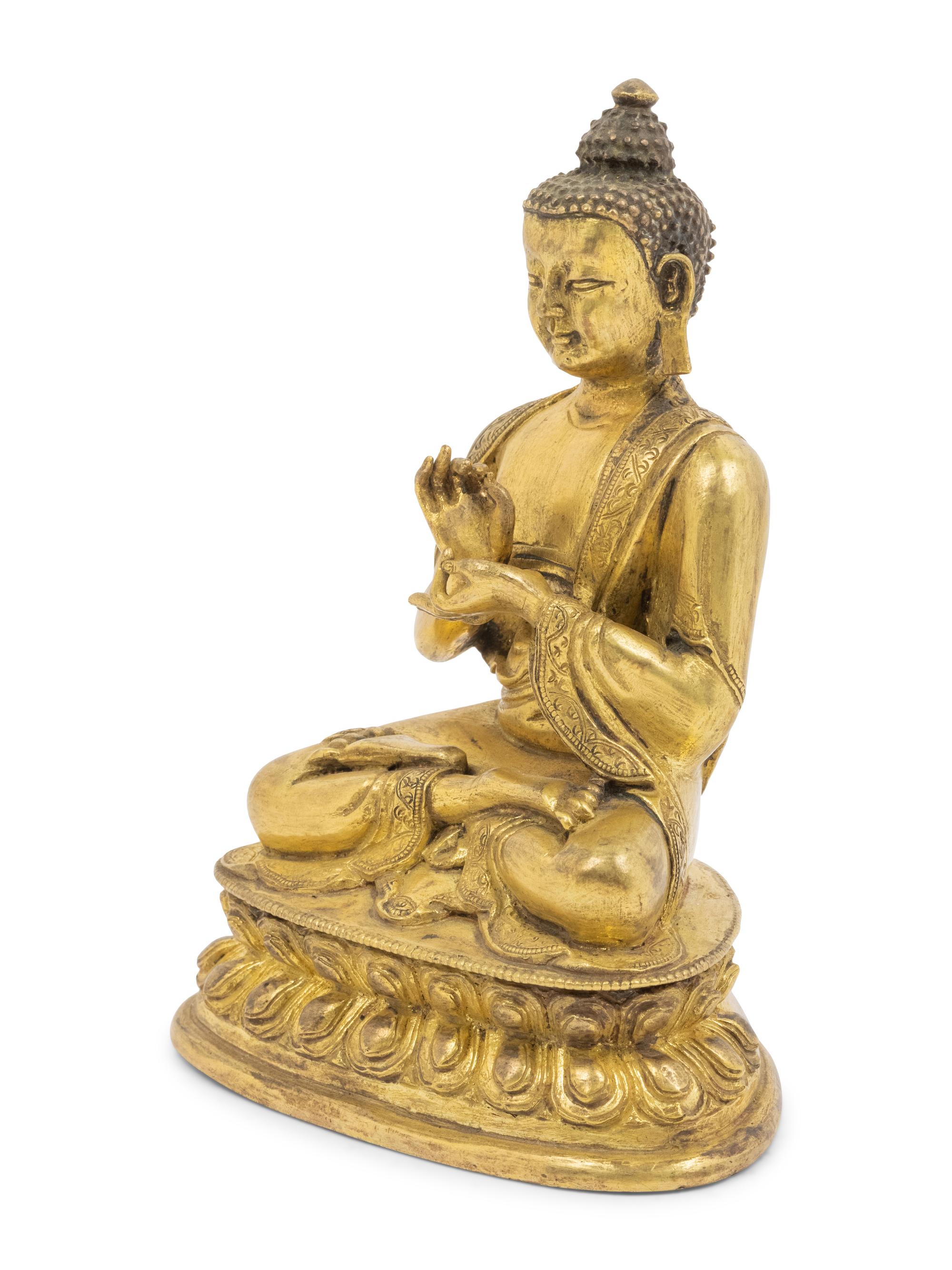 A Sino-Tibetan Gilt Bronze Seated Figure of Buddha Shakyamuni