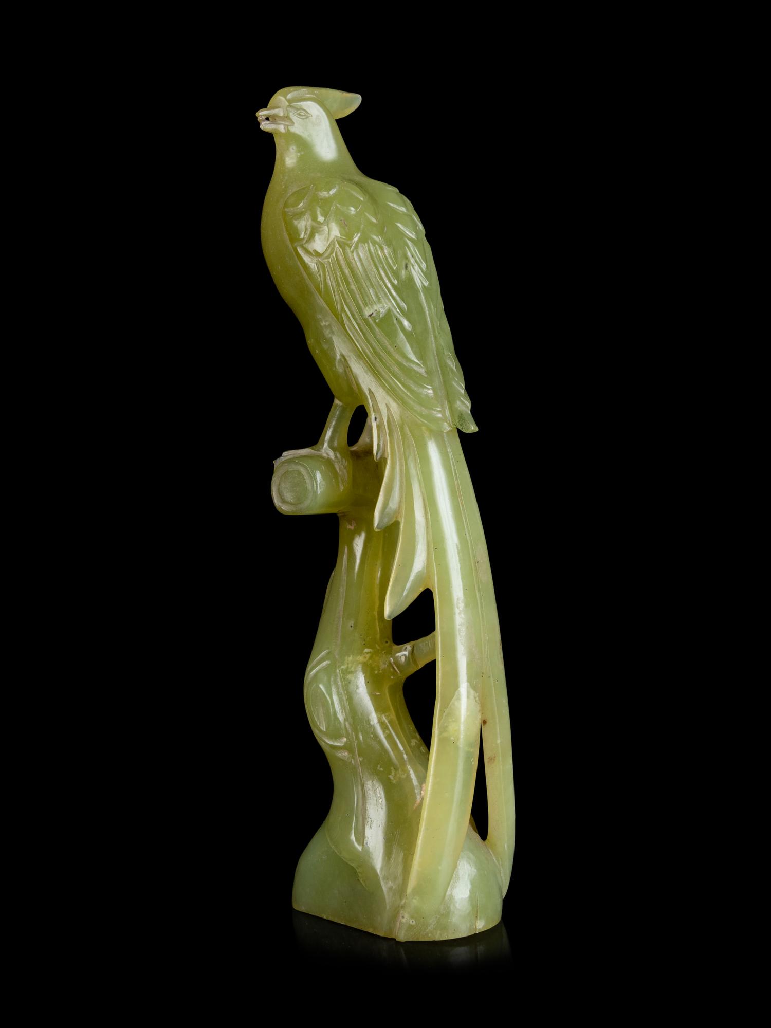 A Chinese Carved Yellow Hardstone Snuff Bottle and A Pair of Chinese Carved Hardstone Figures of Birds