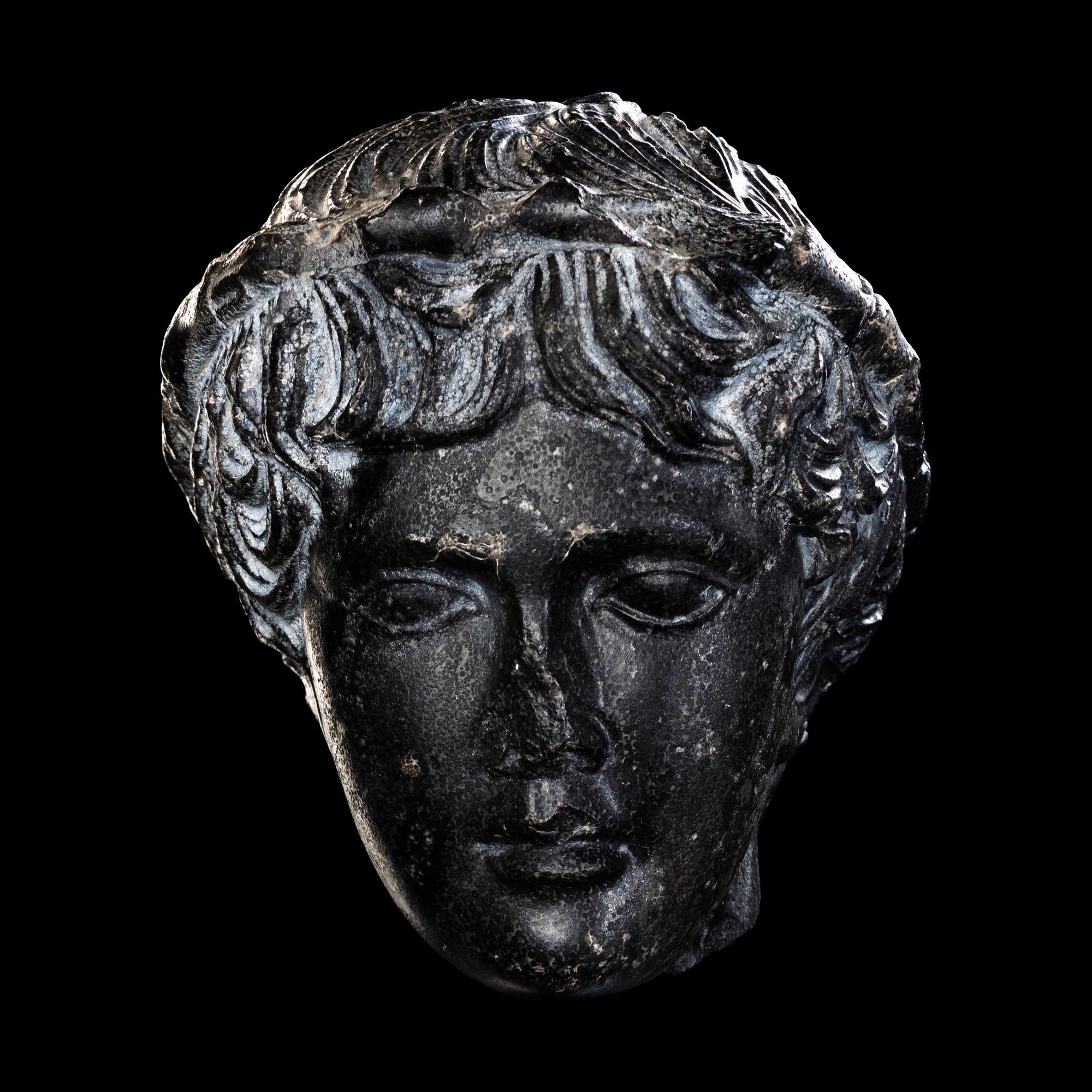 A Roman Black Dolomite Head of a Youth