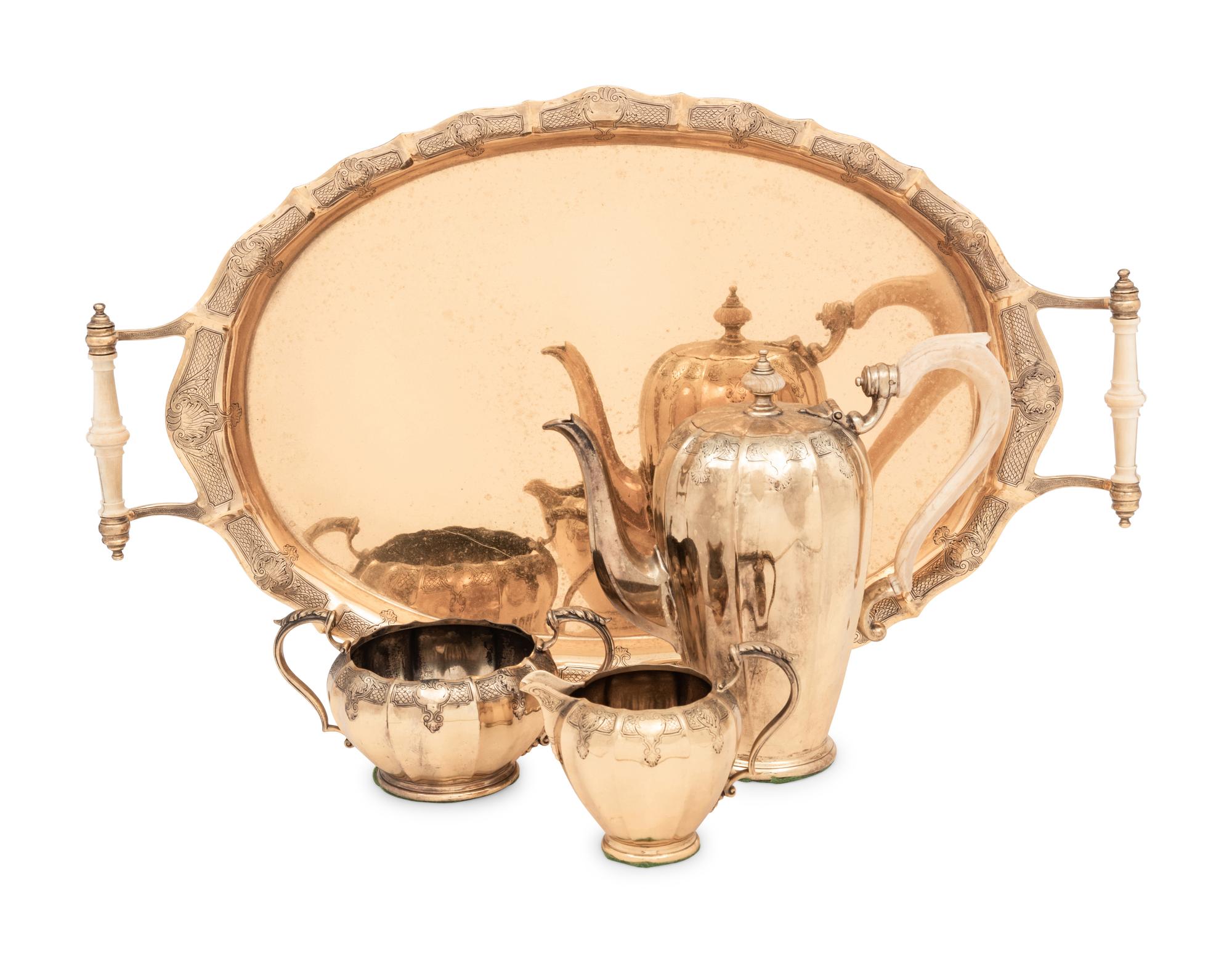 An English Silver-Gilt Four-Piece Coffee Service
