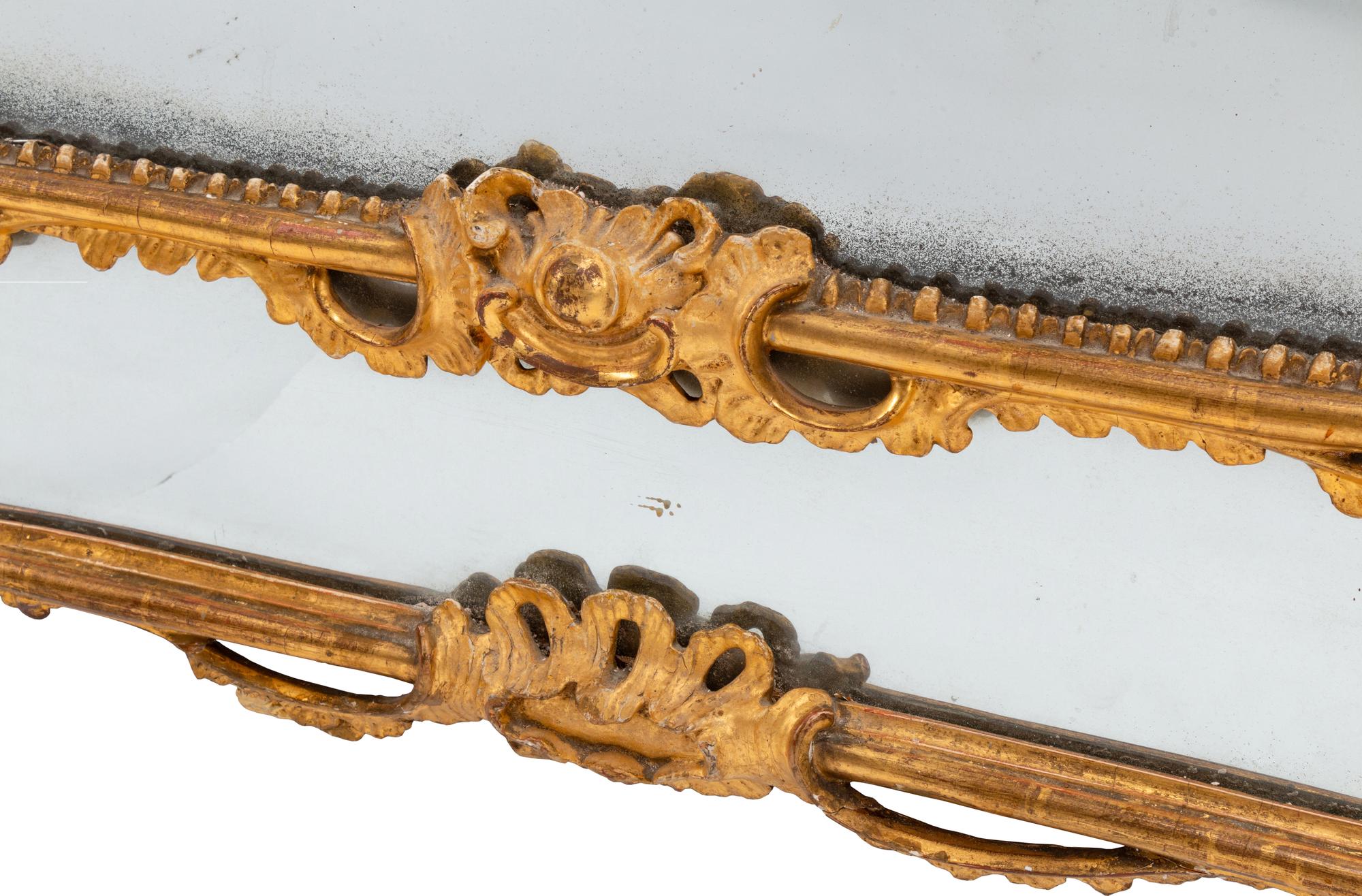 An Italian Rococo Giltwood Mirror