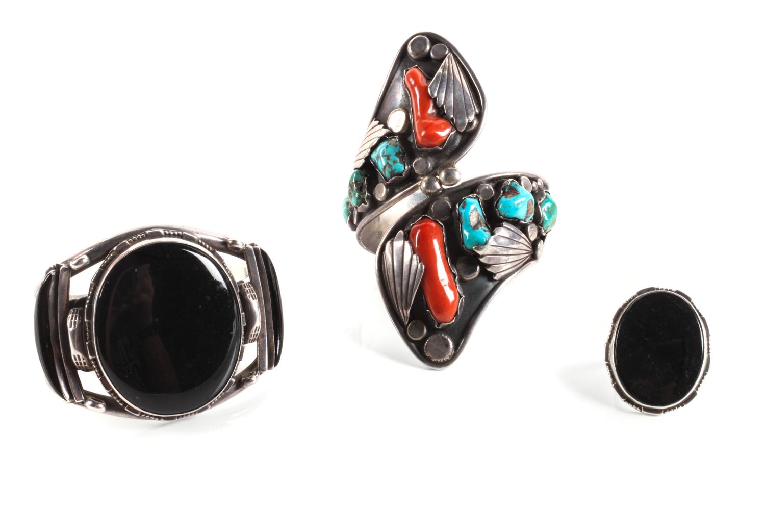 Two Southwestern Cuff Bracelets Length of first 8 x width 4 1/2 inches