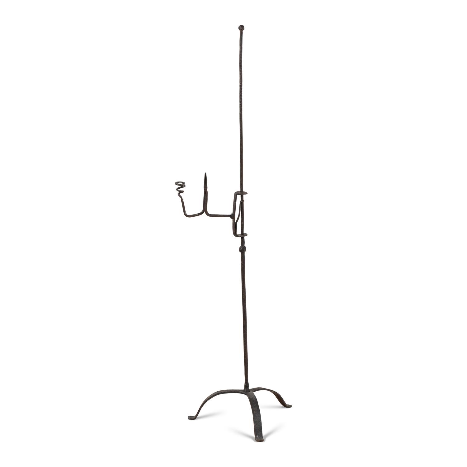 A Wrought Iron Composite Candlestick and Rush Light Stand