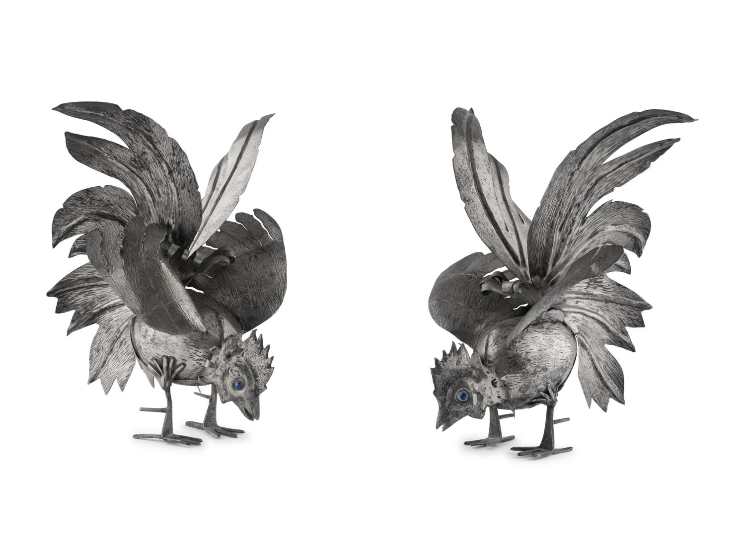 A Pair of Continental Silvered-Metal Roosters