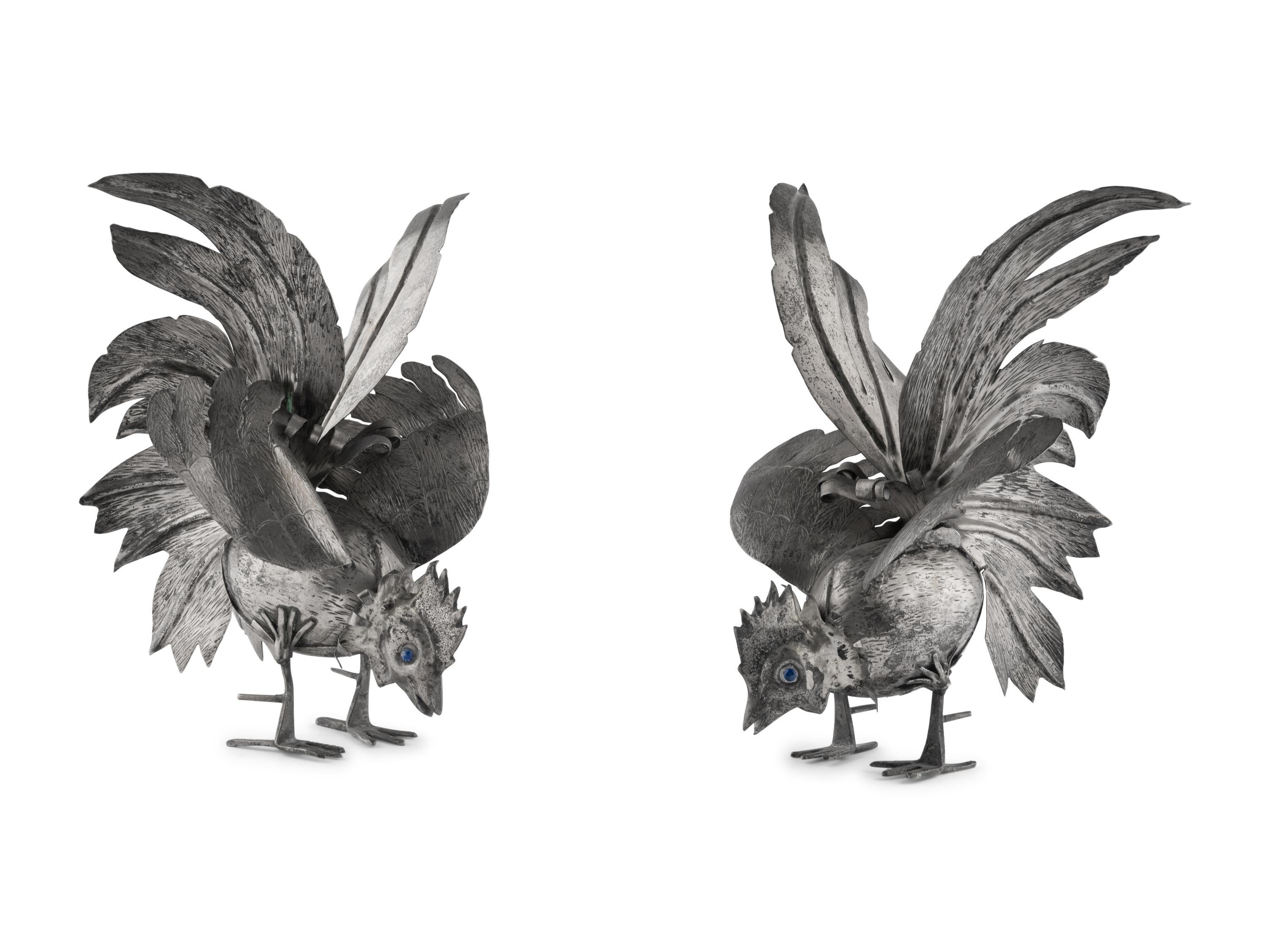 A Pair of Continental Silvered-Metal Roosters