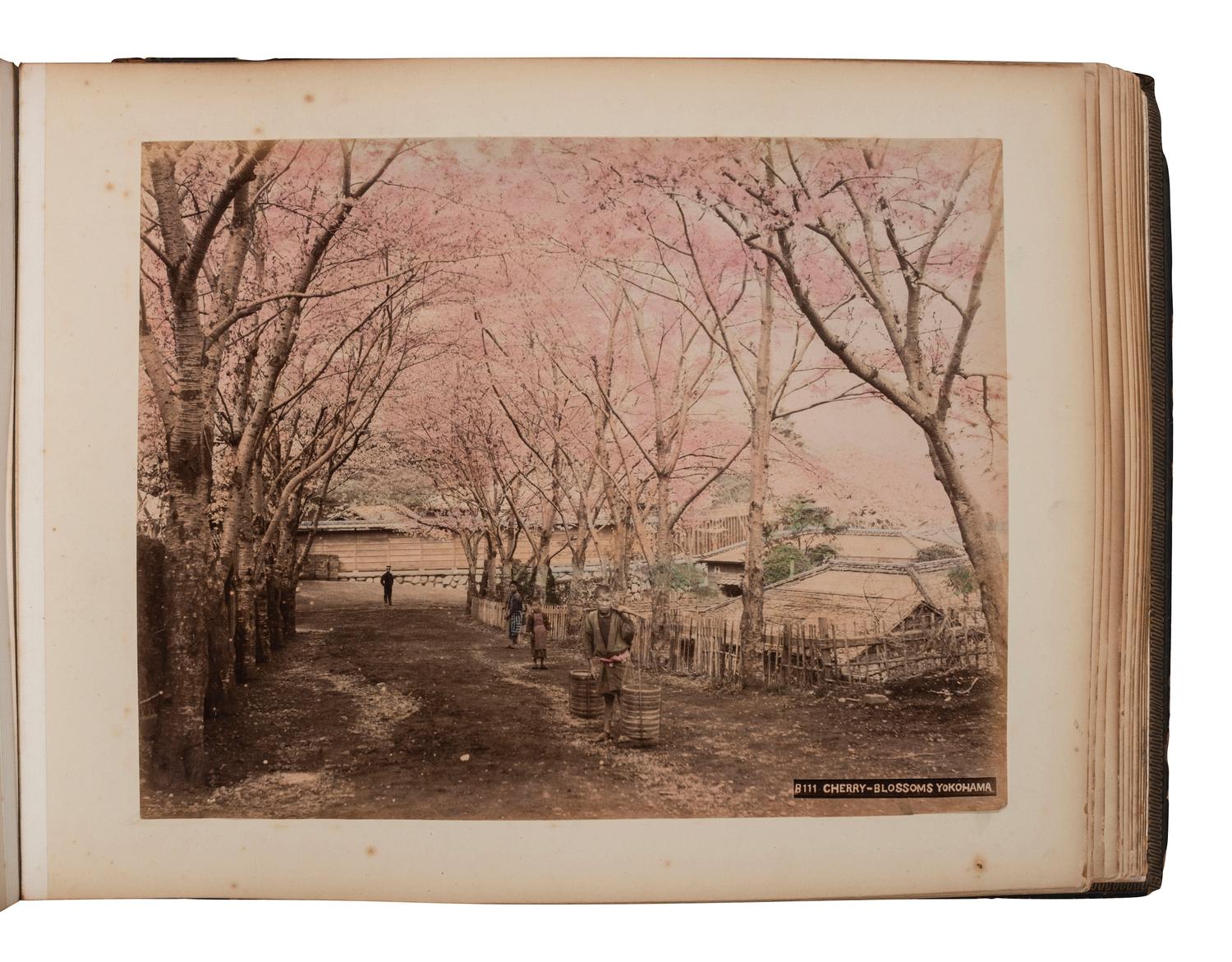 [EARLY PHOTOGRAPHY]. Album containing 50 hand-colored photographs of Japan.