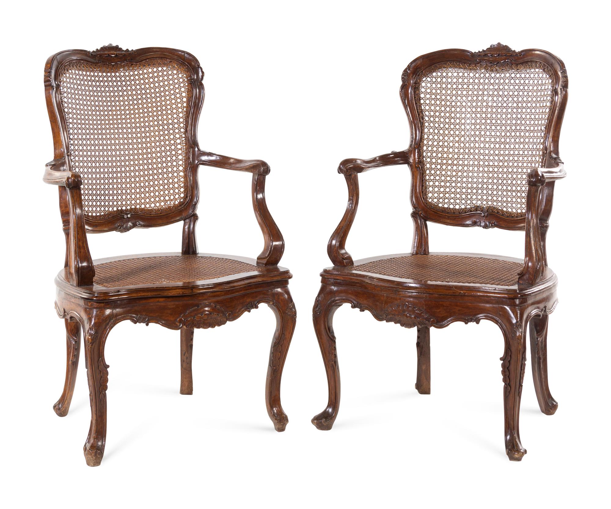 [CLEARED FOR DONATION] A Pair of Louis XV Style Walnut Fauteuils