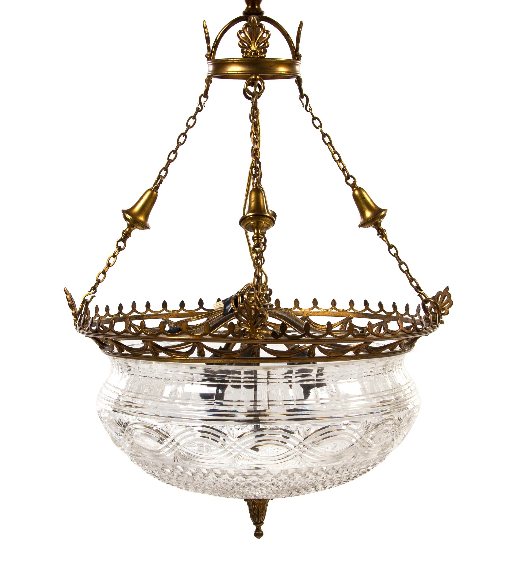 An English Gilt Bronze and Cut Glass Chandelier, Height 24 x diameter 17 inches.