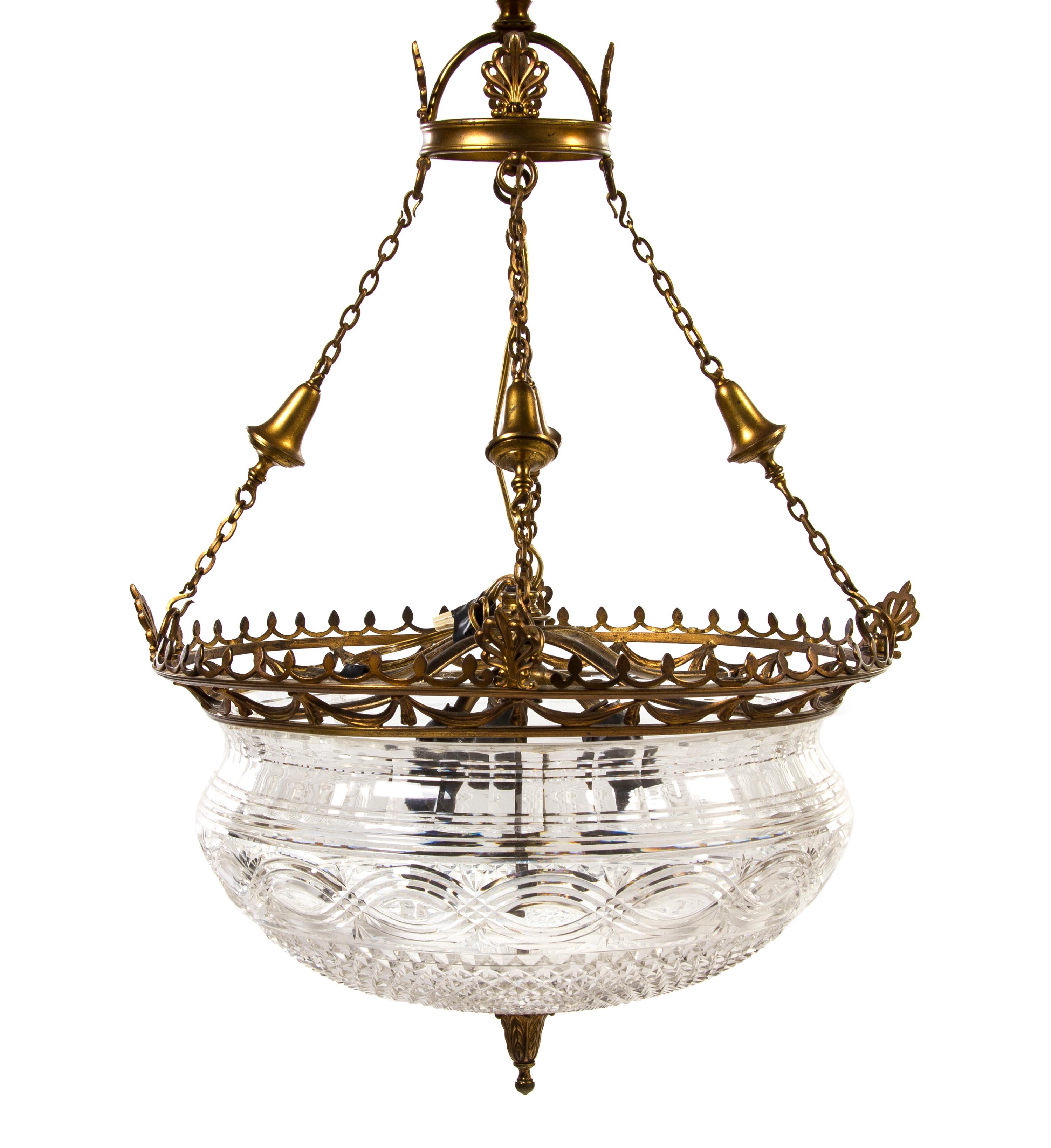 An English Gilt Bronze and Cut Glass Chandelier, Height 24 x diameter 17 inches.