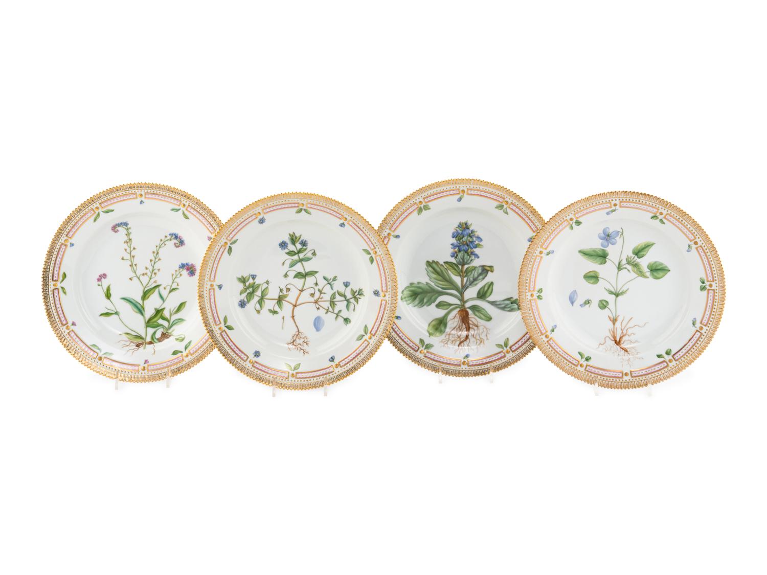 A Set of Eight Royal Copenhagen Flora Danica Porcelain Dinner Plates