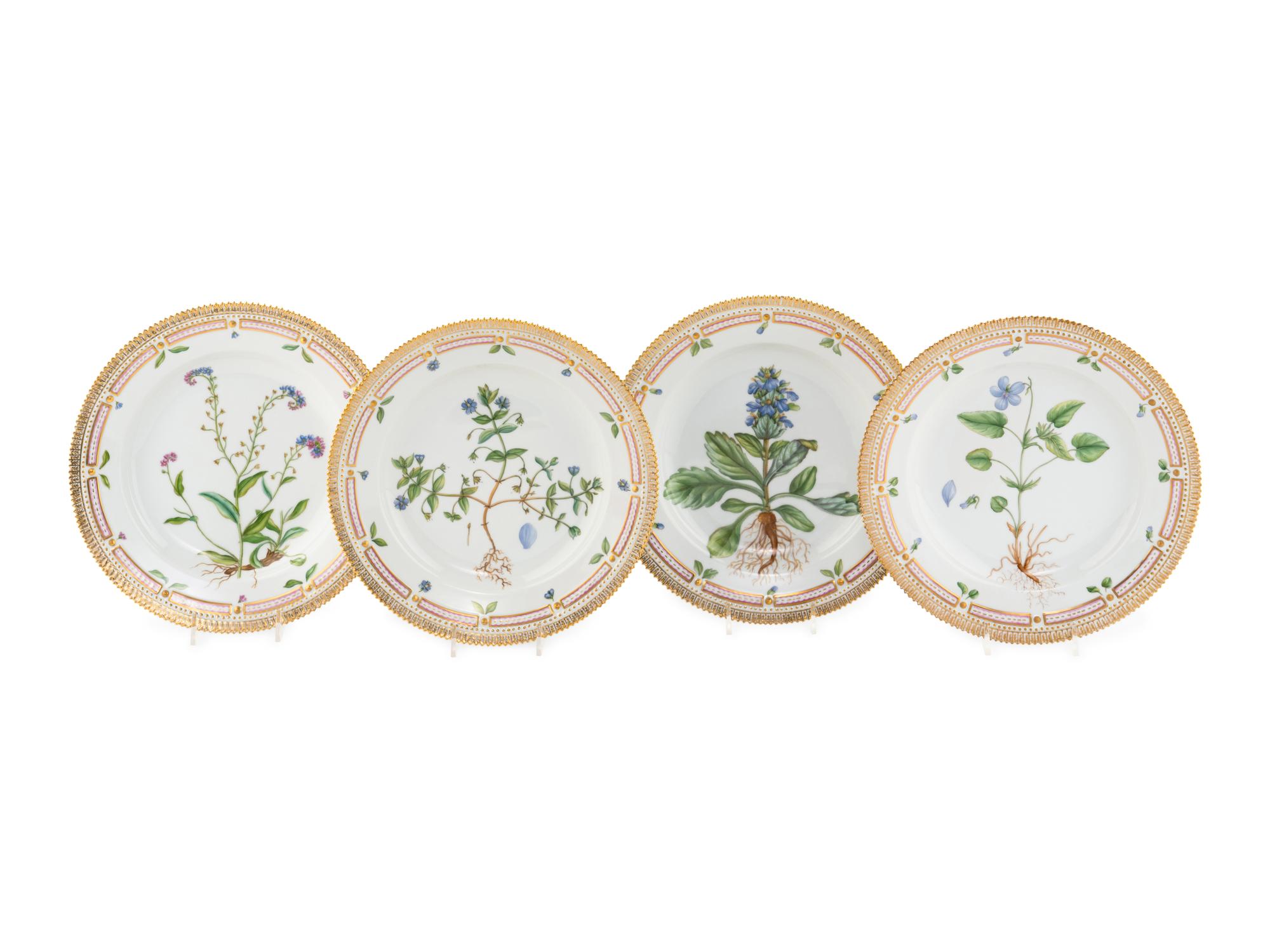 A Set of Eight Royal Copenhagen Flora Danica Porcelain Dinner Plates