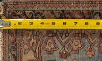 A Fereghan Mat and a Sarouk Mat